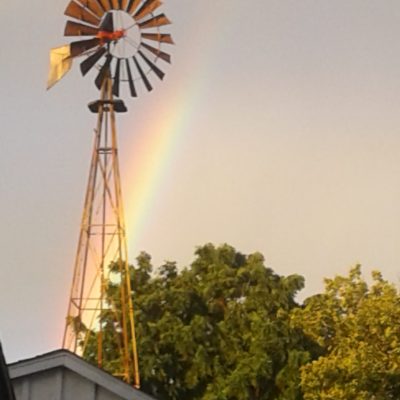 A Rainbow Behind The Windmill At Old Windmill Farm In Lancaster, Pa.